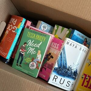 Over 50 books of all different genres. See list for all titles and authors: